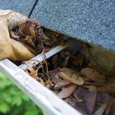 Gutter Cleaning vs Gutter Guards: What Actually Saves Money